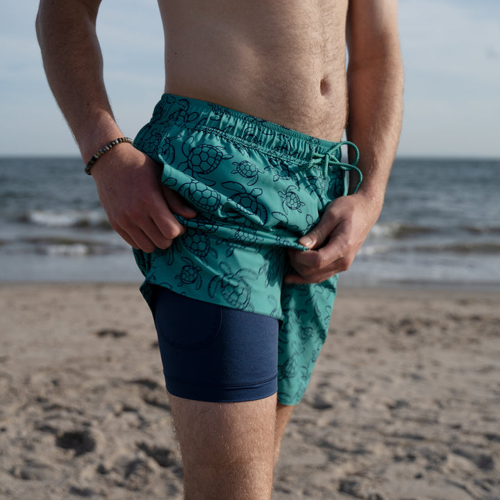 Dreamwave Men's Compression Liner Swim Trunks with Phone Pocket 7 inch Inseam Anti Chafing Teal Sea Turtles
