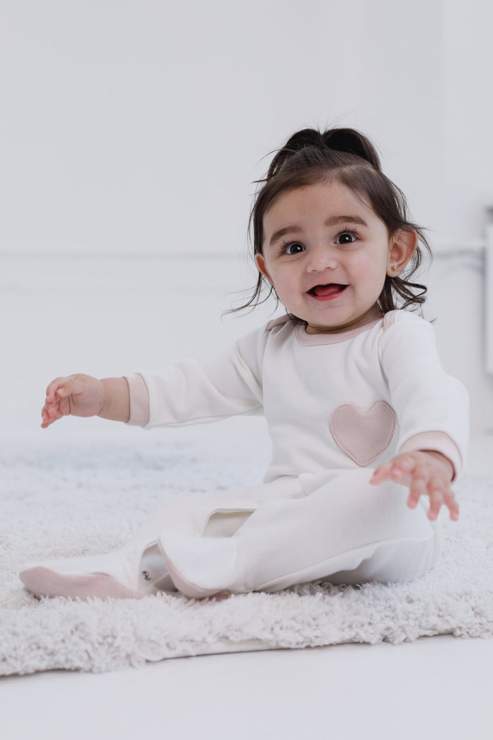 Cozeeme Baby Girls' Footed One Piece Sleep N' Play Ivory Pink Heart