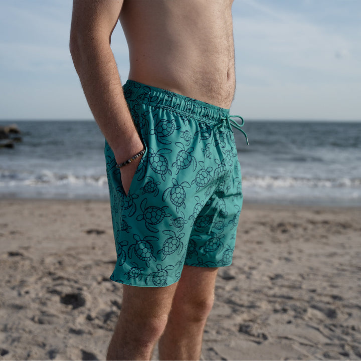 Dreamwave Men's Compression Liner Swim Trunks with Phone Pocket 7 inch Inseam Anti Chafing Teal Sea Turtles